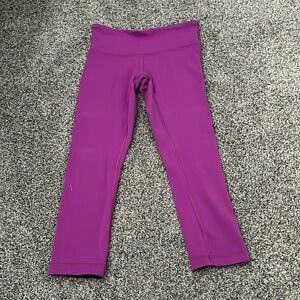 these are 23 inch lululemon pants, size 4 in the color, vivid plum.